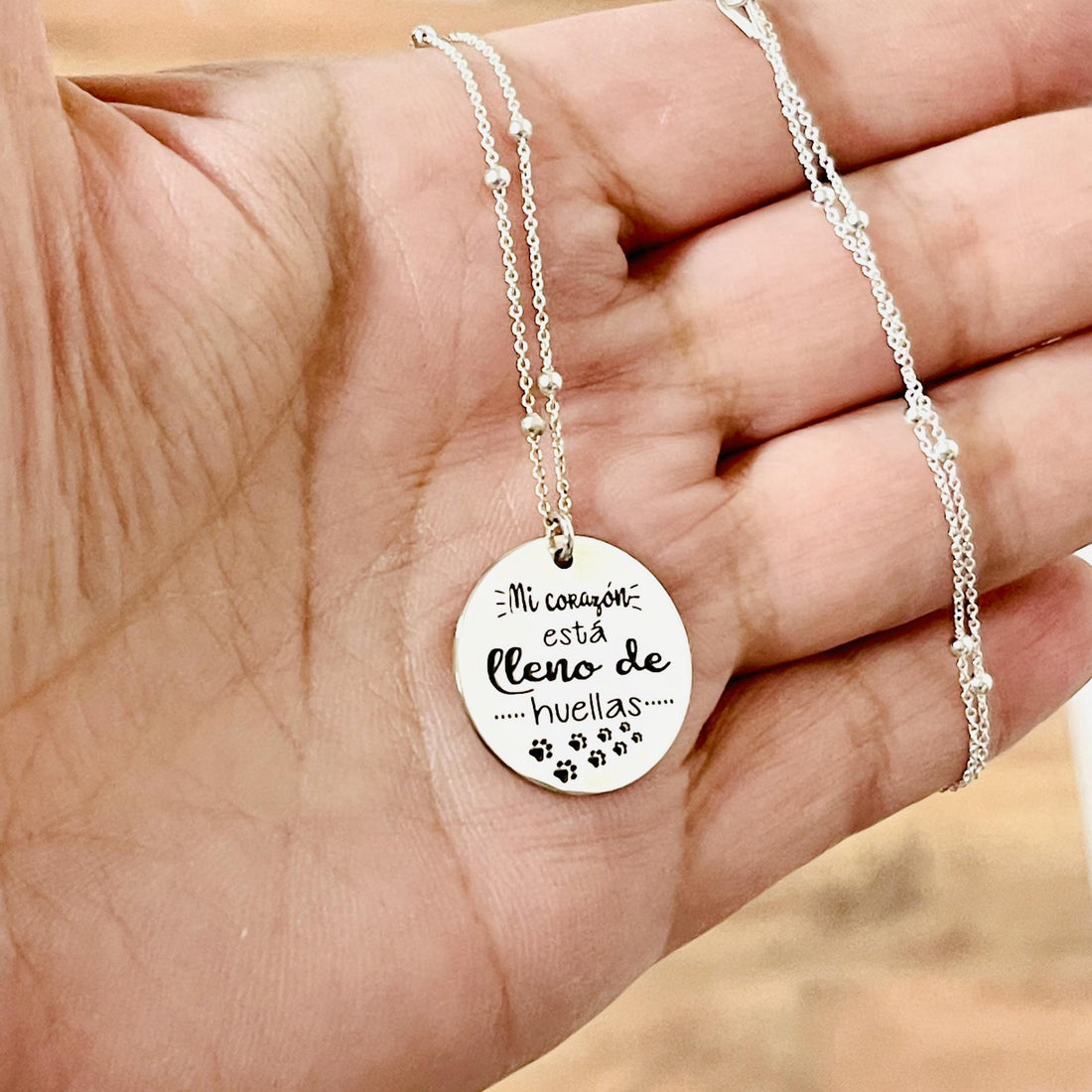 Colgante plata Mi corazón está lleno de huellas